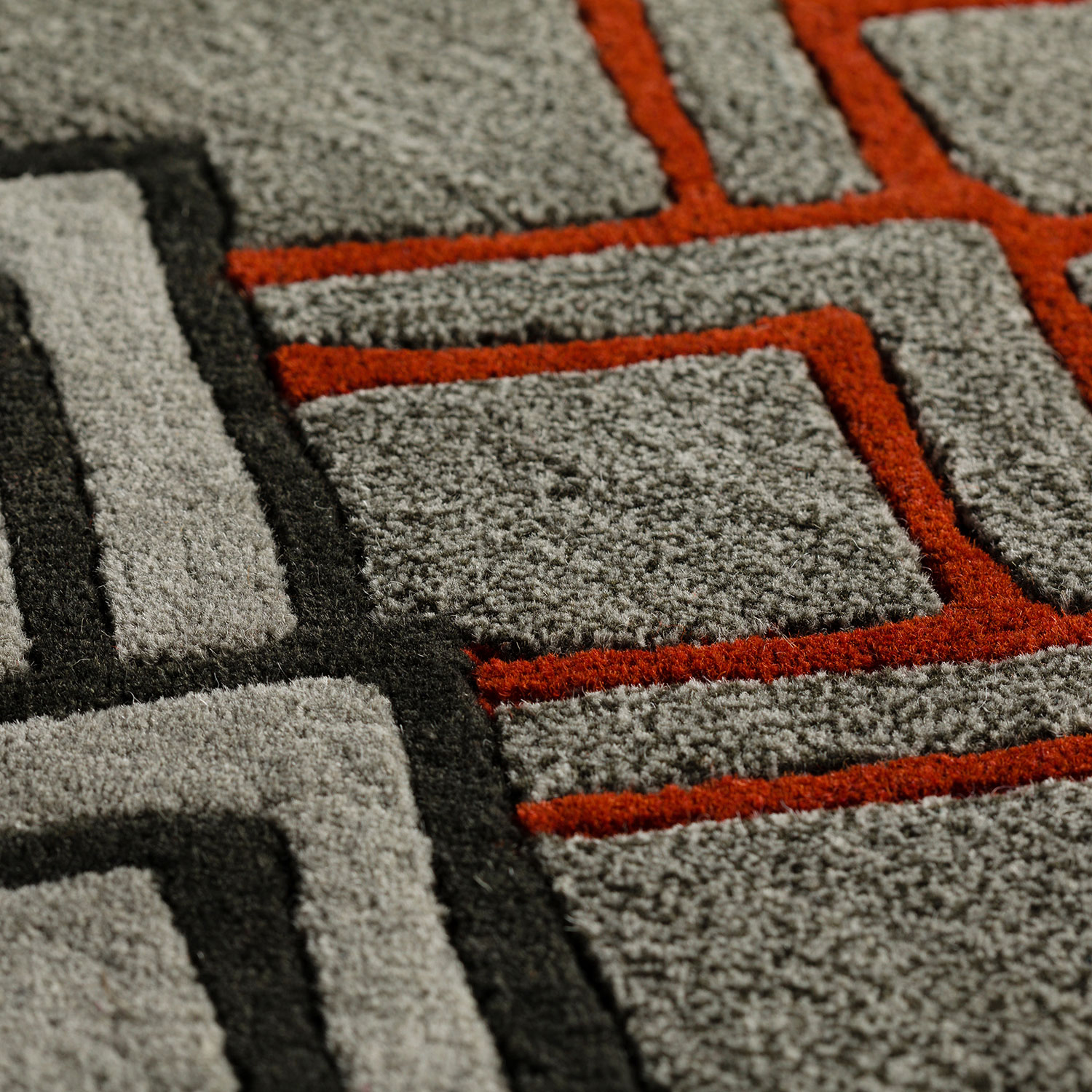 Agra rug closeup of red black and grey rug